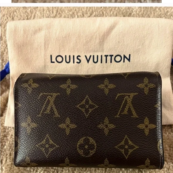 LOUIS VUITTONPortefeuille Alexandre Trifold Wallet w/ Dust Bag.